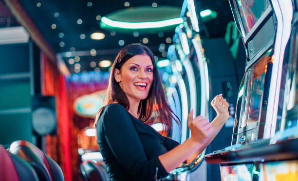 Mobile deposit screen beside a live dealer table